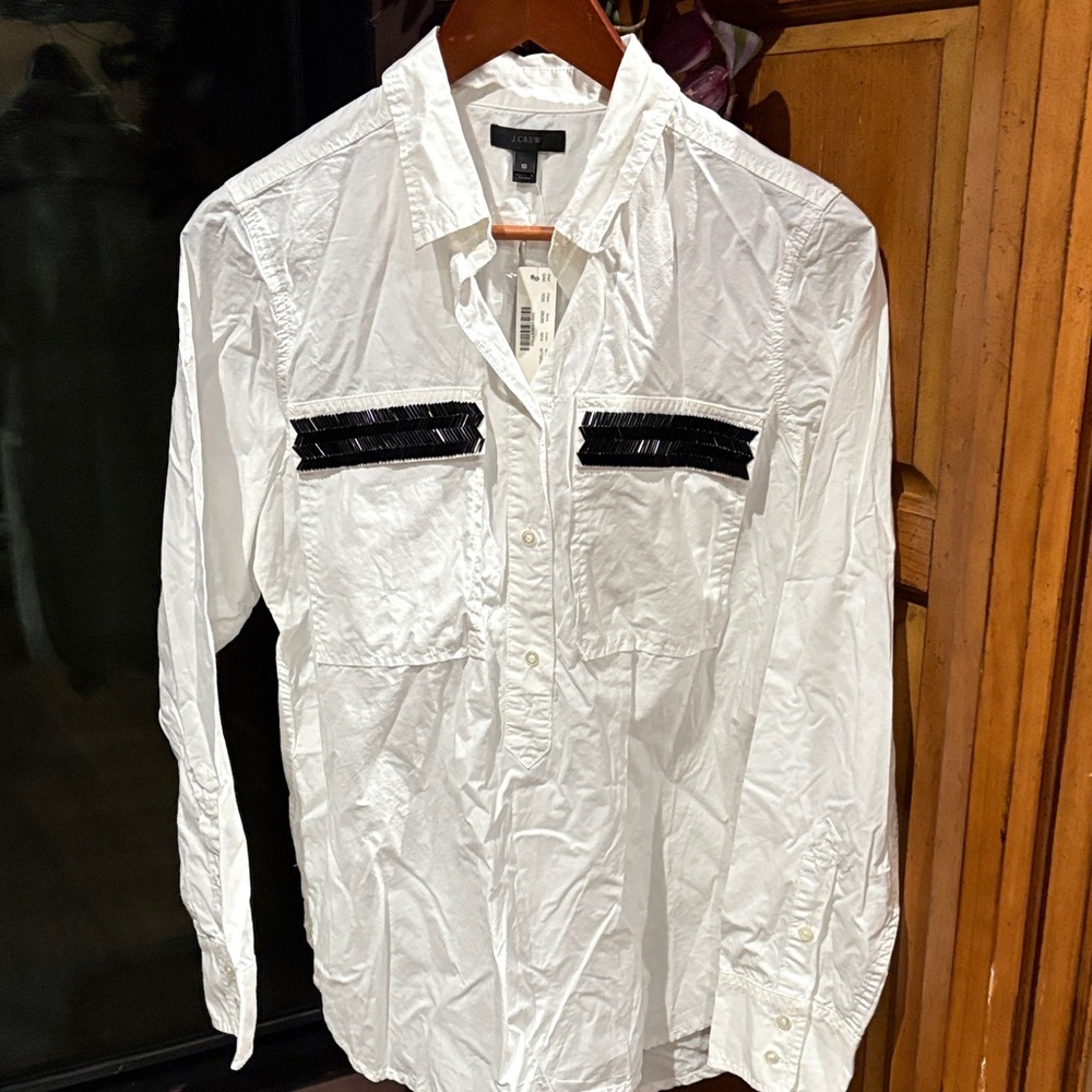 J. Crew Elegant white pullover/button down/tunic with black sequin pockets